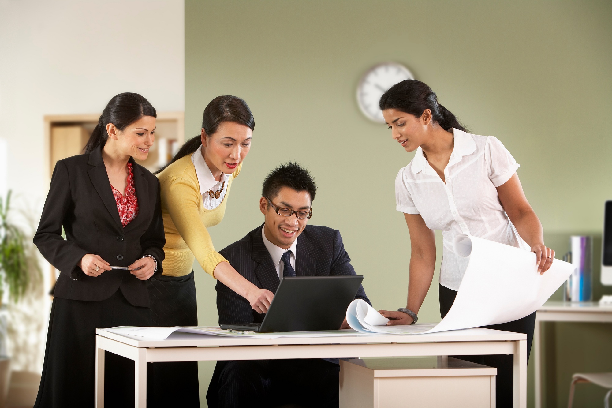 A business group discuss some plans.